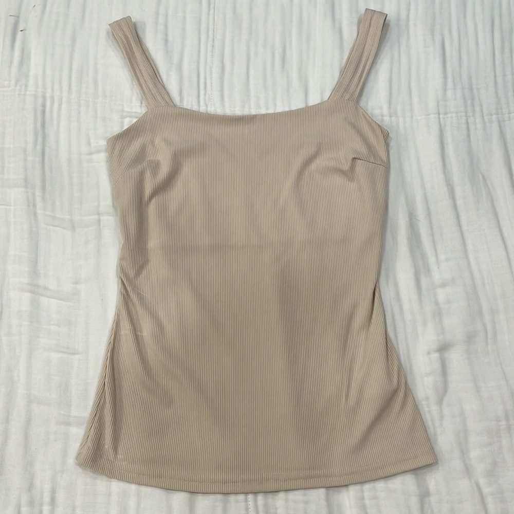 Cream, thick strapped, tank top.